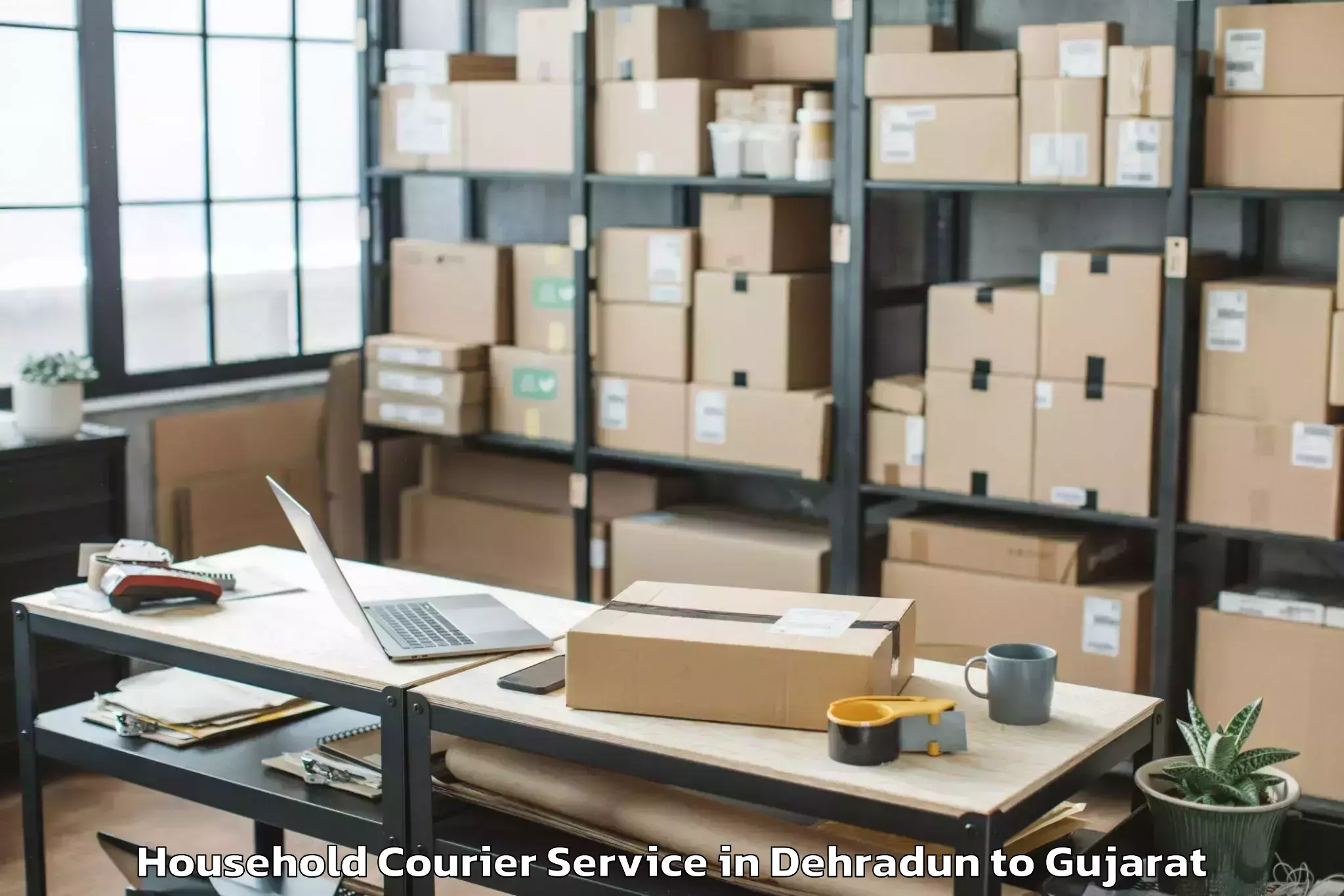 Quality Dehradun to Vansda Household Courier